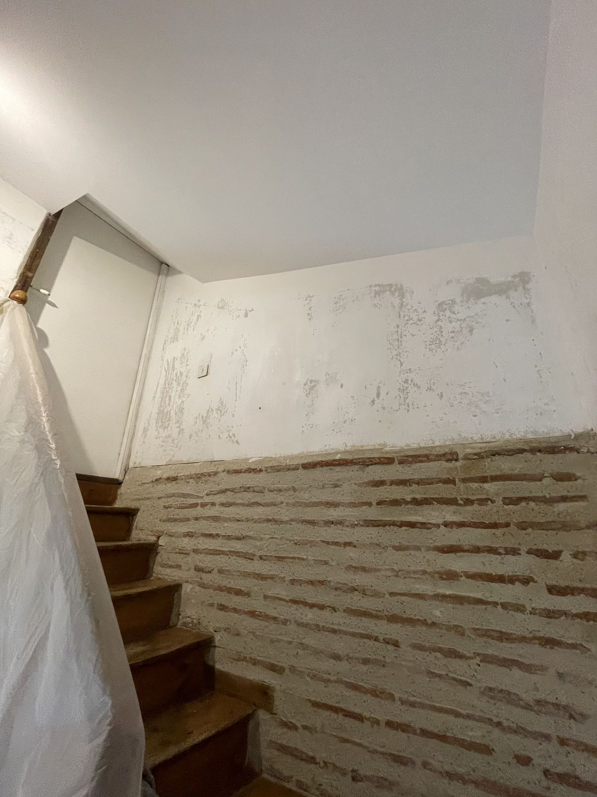 Mur en brique avant enduit